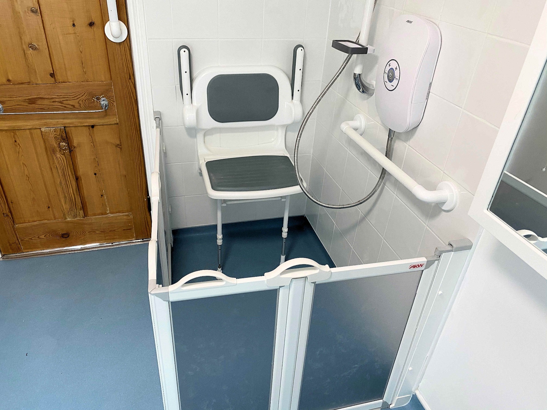 Assisted Bathroom, Accessible shower screen and seat. Barnstaple