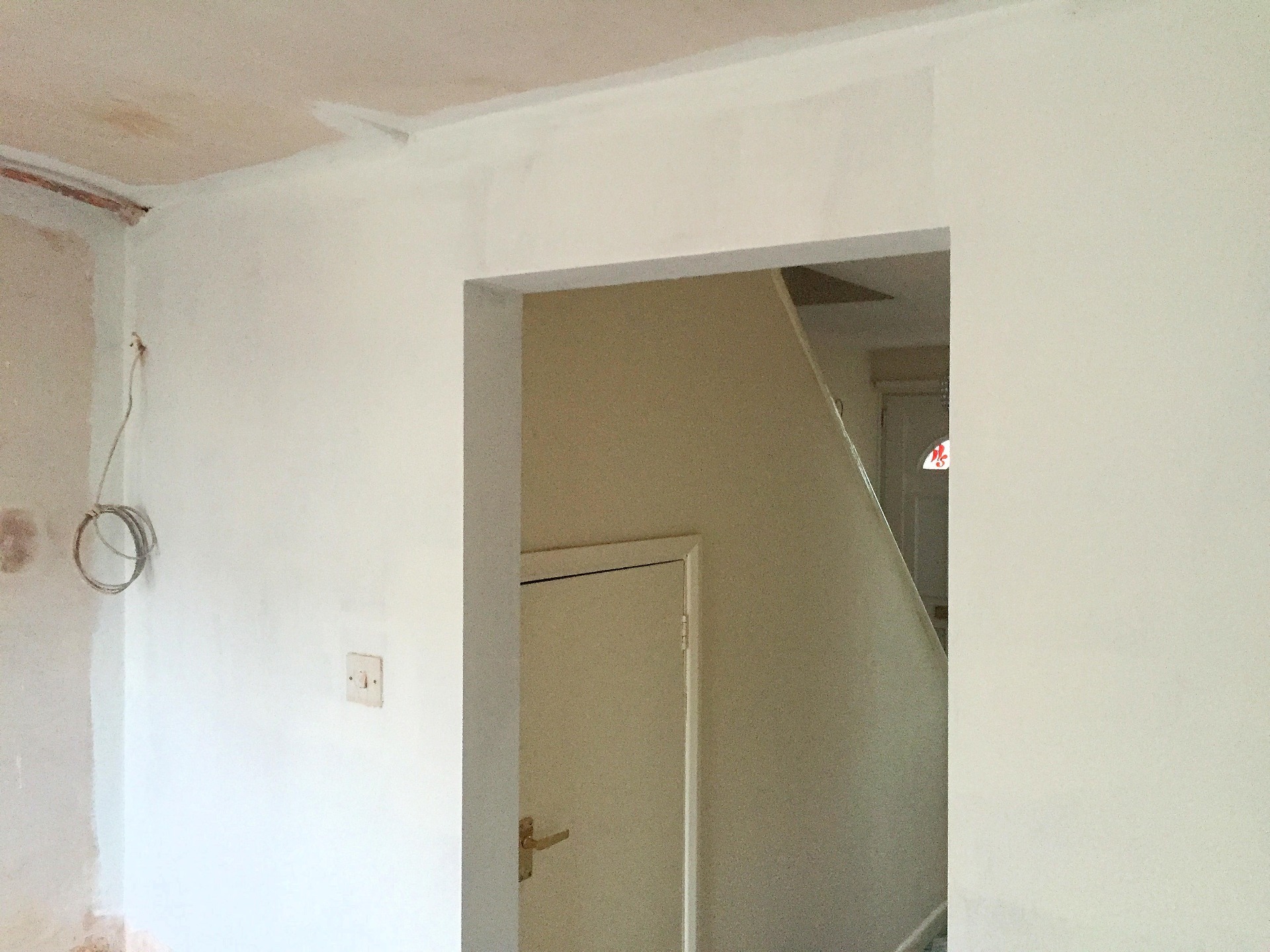 New skimmed walls, mist coat of paint before installation of kitchen Barnstaple Devon