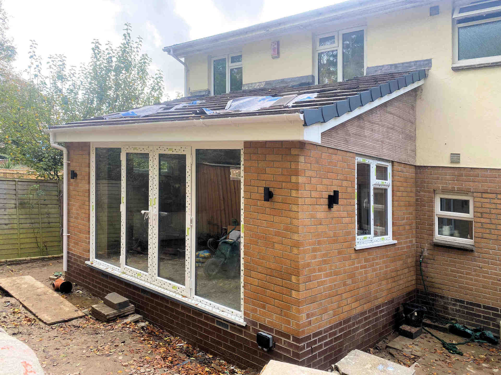 House Extension pitched slated roof and patio doors