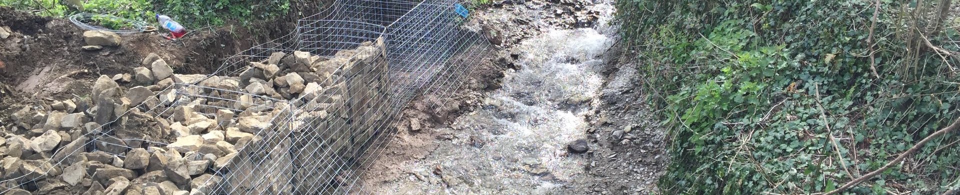 Flood prevention works with gabion baskets in position North Devon