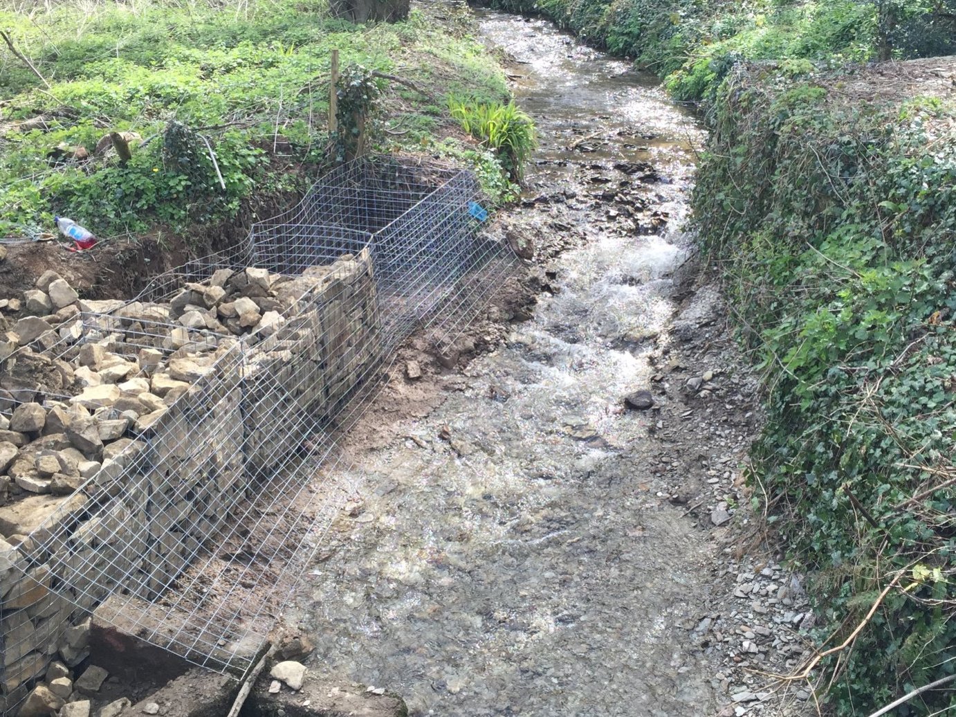 Flood prevention for local North Devon factory required excavation of water course and installation of gabions. Project managed by MJS Building Maintenance Ltd in conjunction with the local Environment Agency.