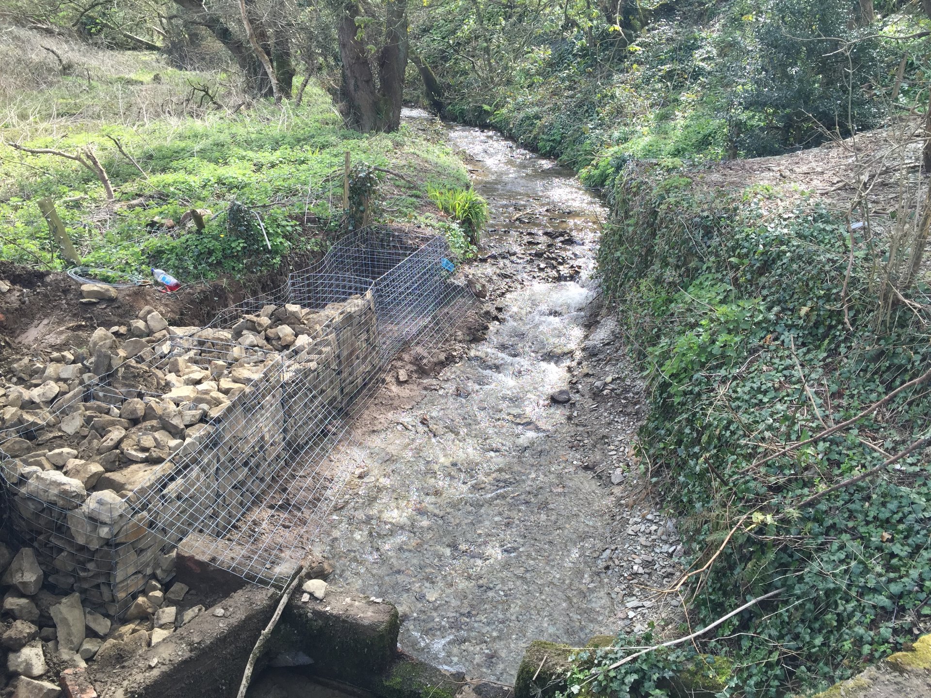 River bed was excavated back to the bed removing all spoil from site, then we started installing the gabion baskets by MJS Building Maintenance Ltd.