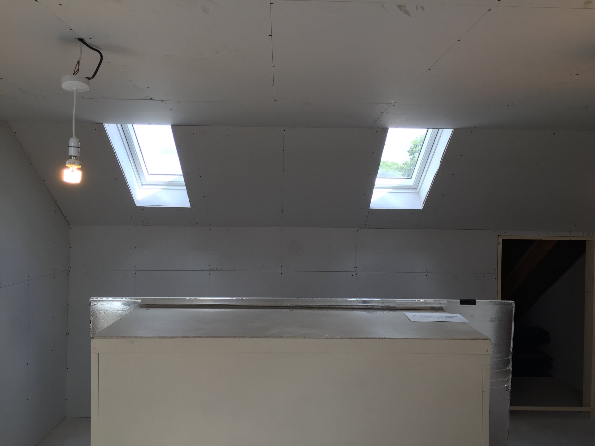 Velux windows were boarded with a splayed opening to enhance light in Devon