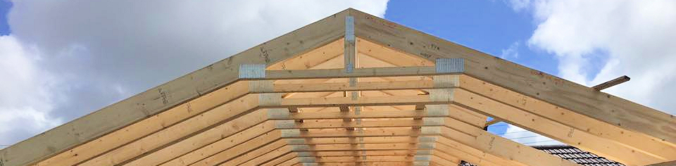 A roof extension for ground floor showing trusses with Velux window cut outs and diminishing trusses to existing bungalow roof