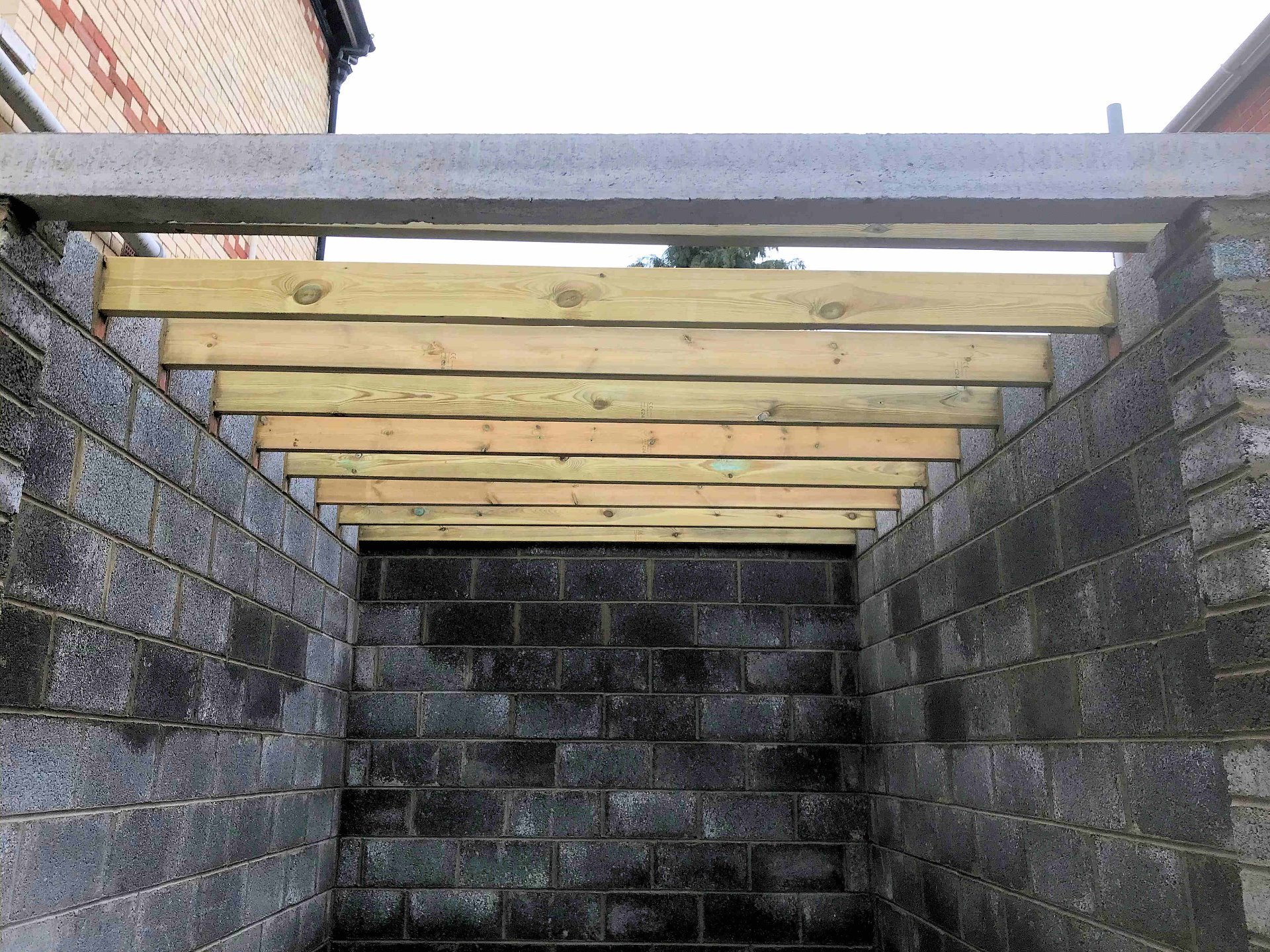 Part of Garage construction , the concrete door lintel and roof joists installed in Barnstaple.