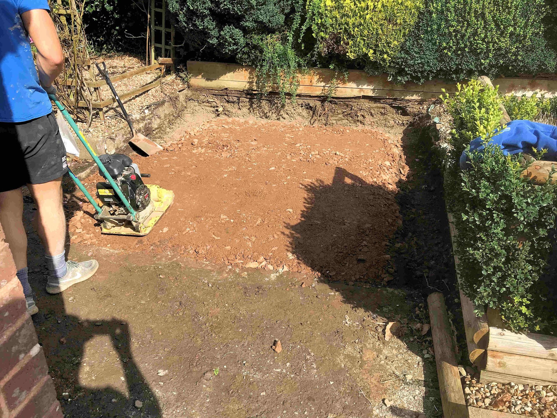 Preparing ground for new hard standing area to the rear of the bungalow. North Devon