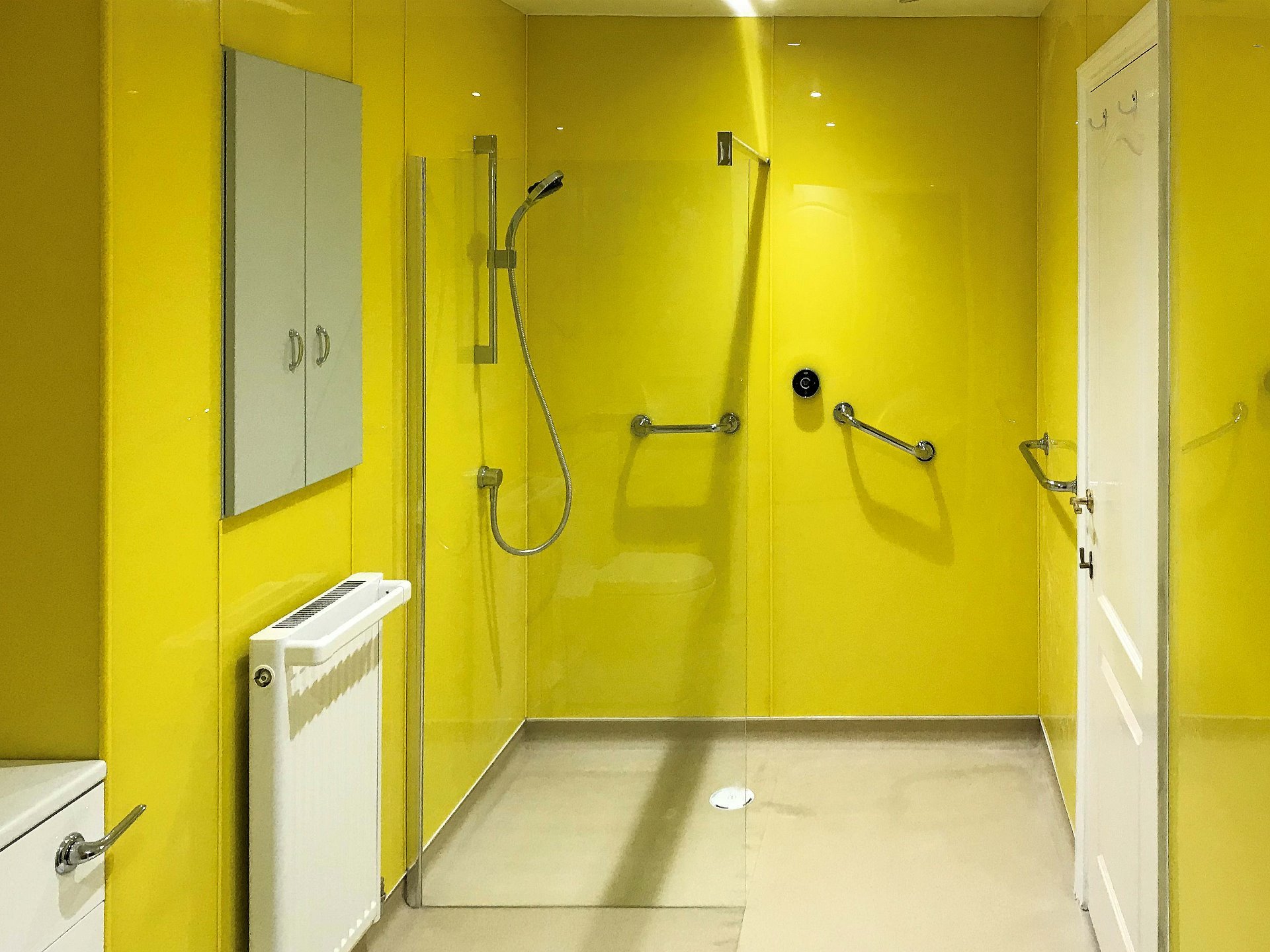 Custom bright yellow wet room North Devon