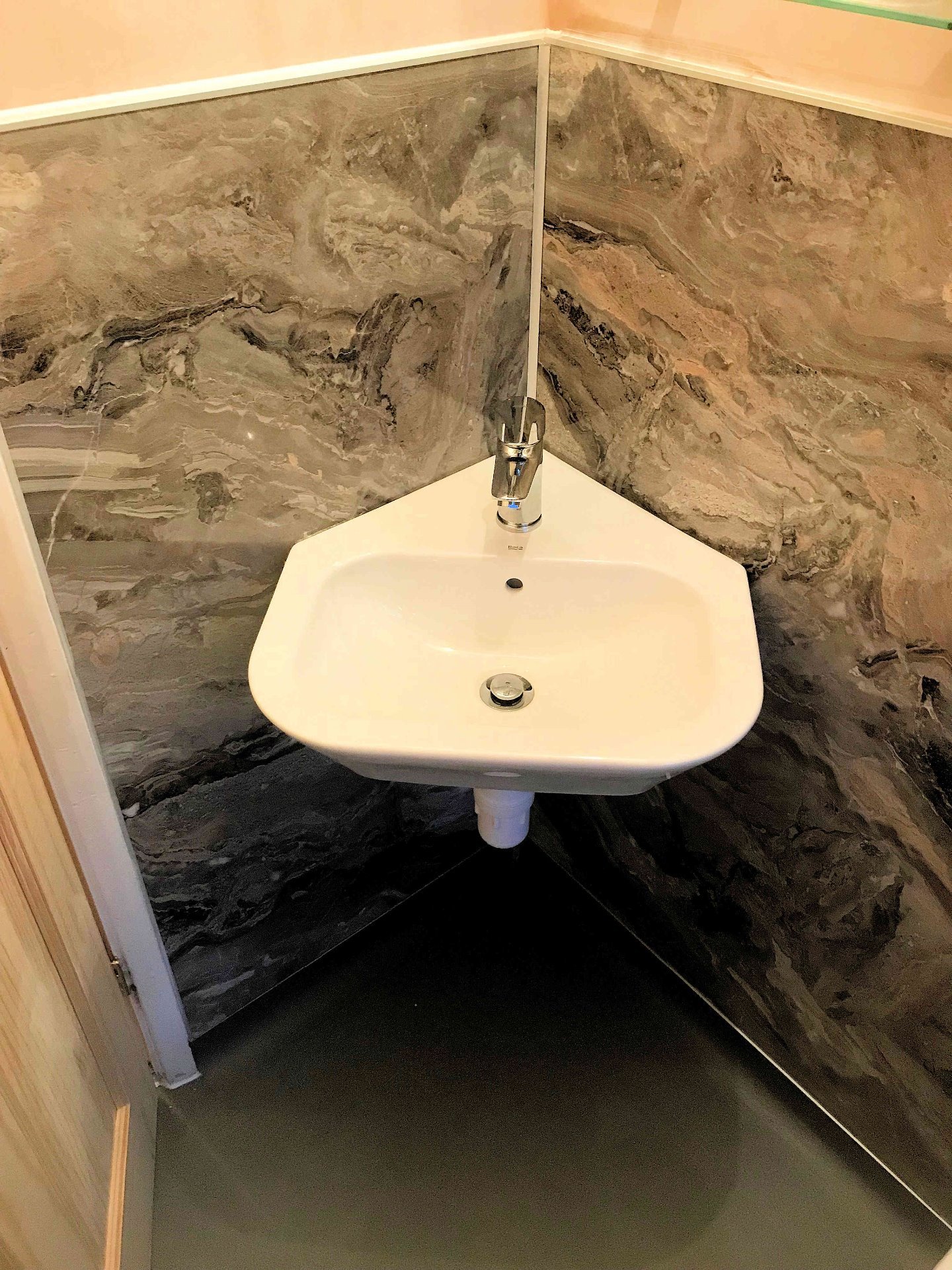 Bathroom to walk in shower room, corner sink basin. Barnstaple North Devon