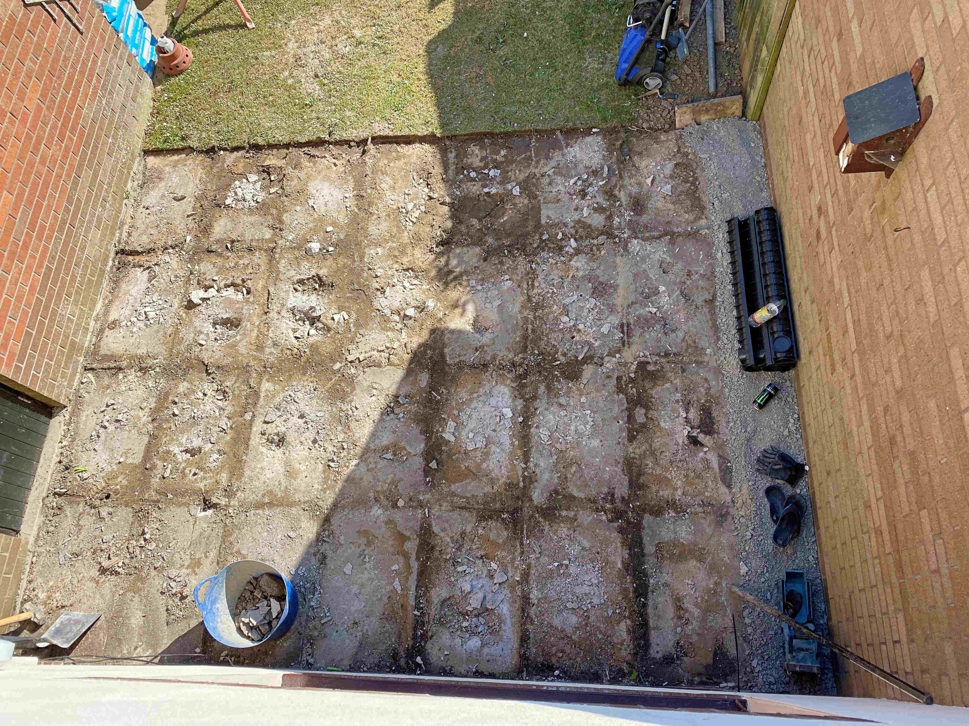 Break up and removal of old patio slabs and excavating 100mm soil. Barnstaple North Devon