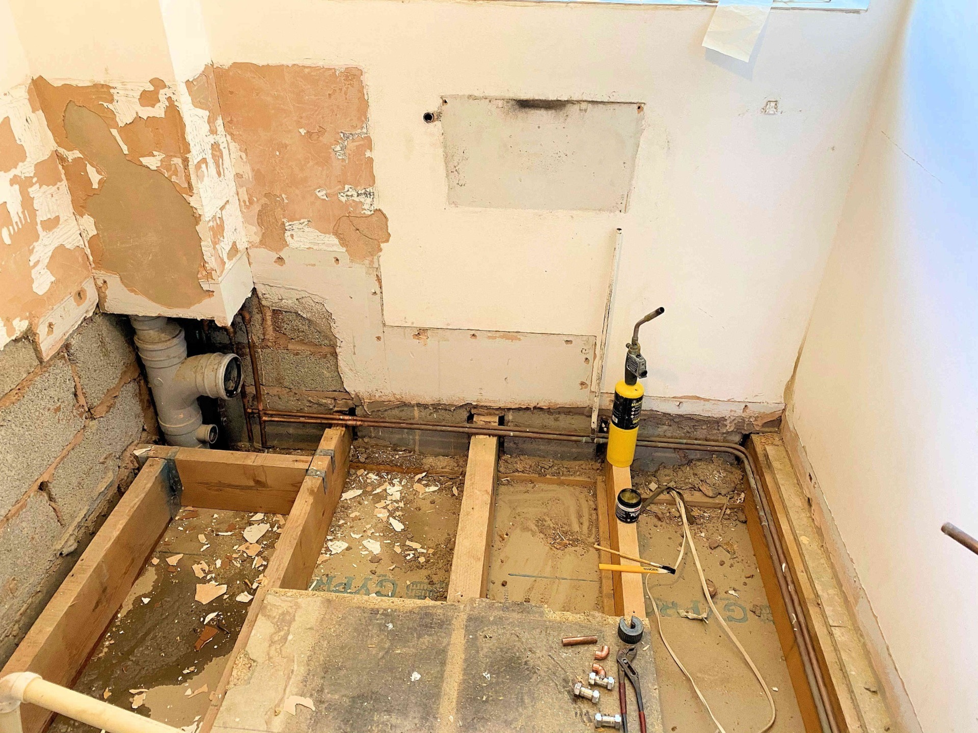 Bathroom to Wet Room; Remove suite and the water damaged floor. Barnstaple North Devon
